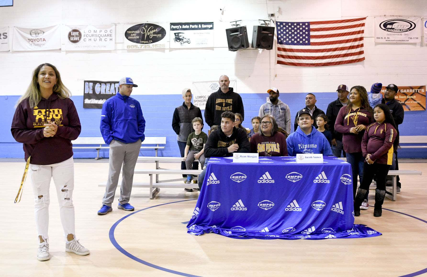 121819 Morgan and Nunez sign 08.jpg